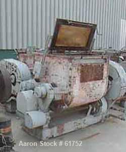 USED: Readco type P.M. 100 gallon double arm mixer. Carbon steel,jacketed, tangential sigma blades geared one end. Bowl measures 31"left to right, 38" front to back, 30" deep. Flat bolt down top cove...
