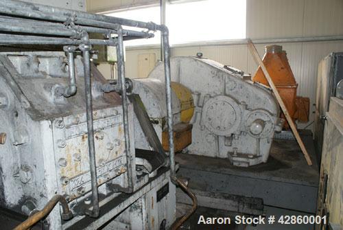 Used Shaw Rubber Kneader, type K2A Mark 3 Intermix double arm mixer. Sturdigear drive. Includes stamps, control panels, operation platform. Working capacity 7.1 gallons (27 liters), total capacity 13...