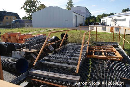 Used Shaw Rubber Kneader, type K2A Mark 3 Intermix double arm mixer. Sturdigear drive. Includes stamps, control panels, operation platform. Working capacity 7.1 gallons (27 liters), total capacity 13...