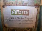 Used Netzsch Double Arm Mixer. Material of construction is stainless steel on product contact parts. Capacity 9.26 gallons (36 liters). Non-jacketed bowl and rated for vacuum (-1). Z-blades. 6.6 hp/4...