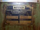 Used Netzsch Double Arm Mixer. Material of construction is stainless steel on product contact parts. Capacity 9.26 gallons (36 liters). Non-jacketed bowl and rated for vacuum (-1). Z-blades. 6.6 hp/4...
