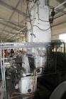 Used Shaw Rubber Kneader, type K2A Mark 3 Intermix double arm mixer. Sturdigear drive. Includes stamps, control panels, operation platform. Working capacity 7.1 gallons (27 liters), total capacity 13...