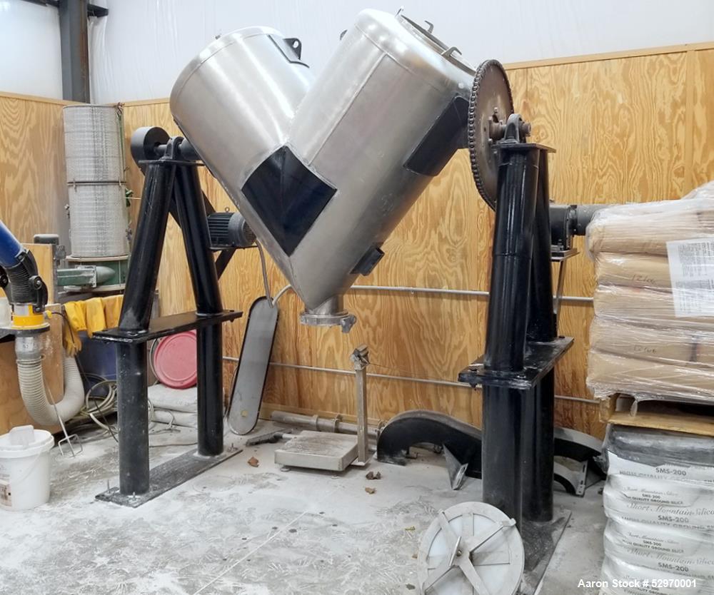 Used Twin Shell "V" Blender with Intensifier Bar, Capacity 20 Cubic Feet. Stainless Steel. Has leg extensions. (2) Charge ports with covers. Shell driven by 2hp, 3/60/230/460 volt, 1800 rpm gear moto...