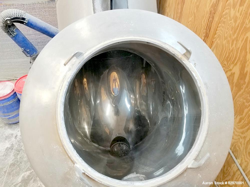 Used Twin Shell "V" Blender with Intensifier Bar, Capacity 20 Cubic Feet. Stainless Steel. Has leg extensions. (2) Charge ports with covers. Shell driven by 2hp, 3/60/230/460 volt, 1800 rpm gear moto...