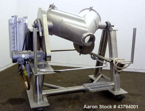 Used Evansville Sheet Metal Works Twin Sheel Blender, Model ESMW-5.0, 316 Stainless Steel. Approximate 18" diameter charge ports with Quick release covers. Approximate 6" center bottom outlet, no val...