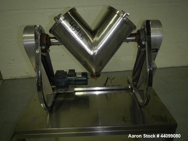 Used Patterson Kelley twin shell blender, 8 quart stainless steel construction, liquid solids bar less drive, approx. 1/5 hp shell drive with covers, serial# LB-8748.