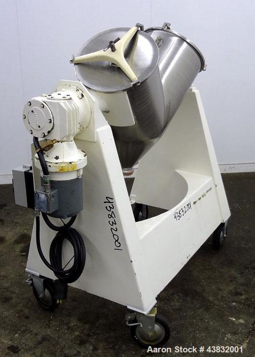 Used Apex Construction Limited Twin Shell Blender, approximately 4 cubic feet capacity, 321 stainless steel. (2) 15" diameter charge ports with quick release covers. Shell driven by a 1/2 hp, 3/60/38...
