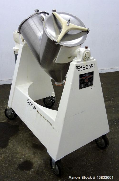 Used Apex Construction Limited Twin Shell Blender, approximately 4 cubic feet capacity, 321 stainless steel. (2) 15" diameter charge ports with quick release covers. Shell driven by a 1/2 hp, 3/60/38...