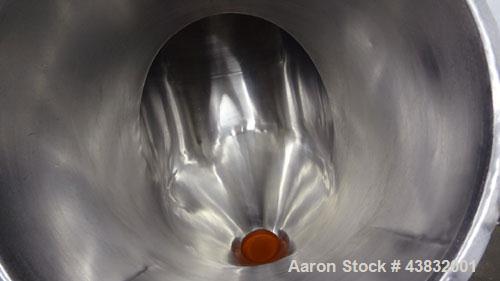 Used Apex Construction Limited Twin Shell Blender, approximately 4 cubic feet capacity, 321 stainless steel. (2) 15" diameter charge ports with quick release covers. Shell driven by a 1/2 hp, 3/60/38...