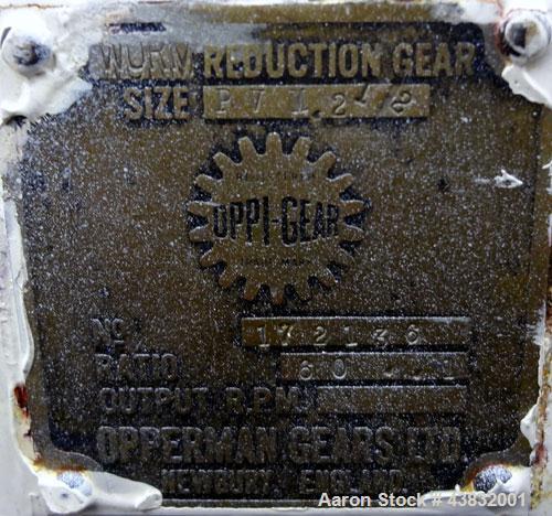 Used Apex Construction Limited Twin Shell Blender, approximately 4 cubic feet capacity, 321 stainless steel. (2) 15" diameter charge ports with quick release covers. Shell driven by a 1/2 hp, 3/60/38...
