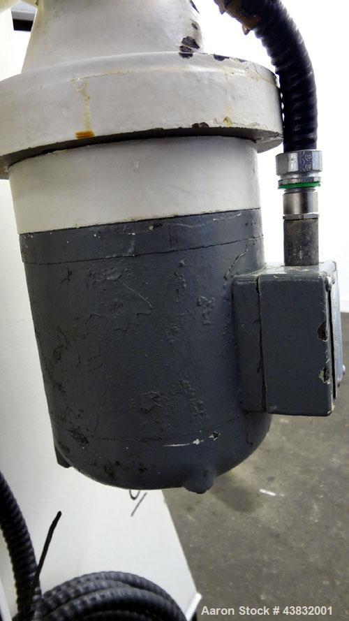 Used Apex Construction Limited Twin Shell Blender, approximately 4 cubic feet capacity, 321 stainless steel. (2) 15" diameter charge ports with quick release covers. Shell driven by a 1/2 hp, 3/60/38...