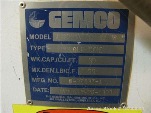 Used-Gemco 30 cubic foot Gemcomatic double cone blender. Complete with loader and unloader. Has liquid/solid intensifier bar...