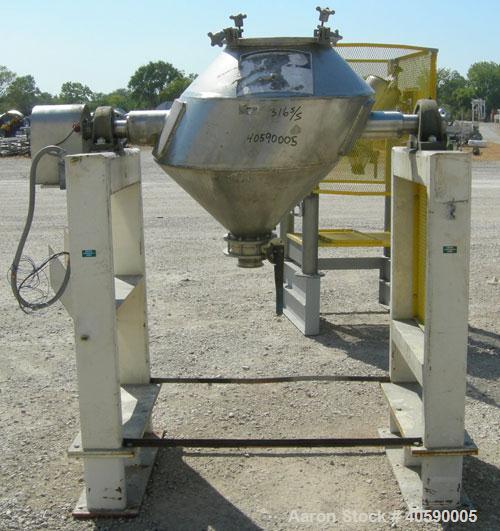 Used Gemco Slant Cone Blender, 5 cubic feet working capacity, 316 stainless steel. Maximum material density 265 pounds per cubic foot. Approximately 31 1/2'' diameter x 10'' and 17'' cones. 16'' char...