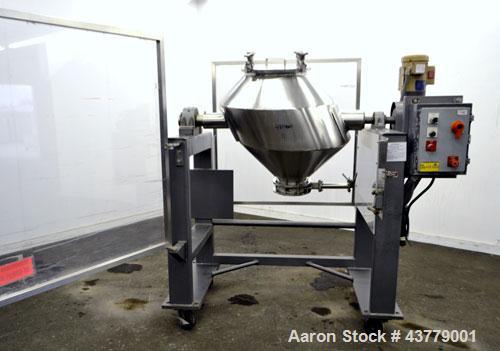 Used Gemco Slant Cone Blender, 5 Cubic Feet Working Capacity, 316 Stainless Steel. Approximately 31-1/2” diameter x 16” and 10” cones.  16” Diameter charge port with cover, 6” center bottom outlet wi...