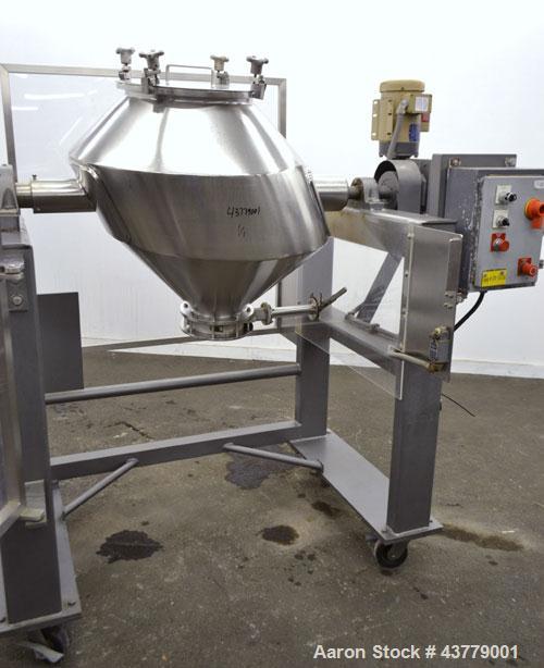 Used Gemco Slant Cone Blender, 5 Cubic Feet Working Capacity, 316 Stainless Steel. Approximately 31-1/2” diameter x 16” and 10” cones.  16” Diameter charge port with cover, 6” center bottom outlet wi...