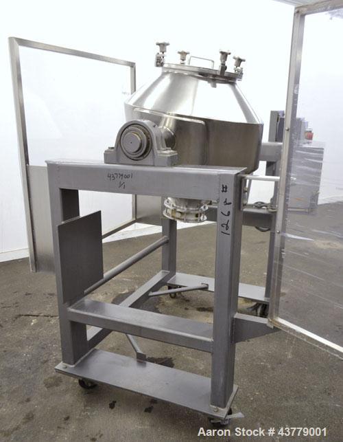 Used Gemco Slant Cone Blender, 5 Cubic Feet Working Capacity, 316 Stainless Steel. Approximately 31-1/2” diameter x 16” and 10” cones.  16” Diameter charge port with cover, 6” center bottom outlet wi...
