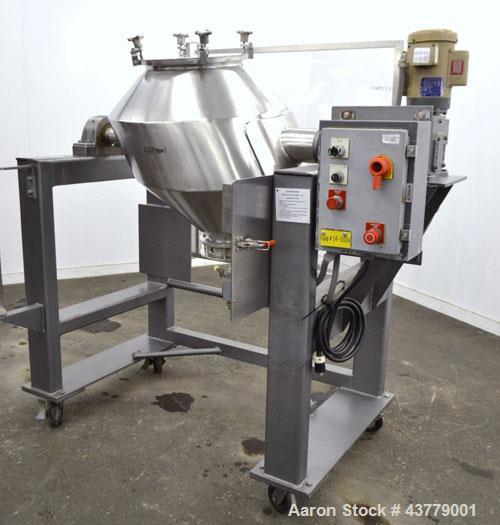 Used Gemco Slant Cone Blender, 5 Cubic Feet Working Capacity, 316 Stainless Steel. Approximately 31-1/2” diameter x 16” and 10” cones.  16” Diameter charge port with cover, 6” center bottom outlet wi...