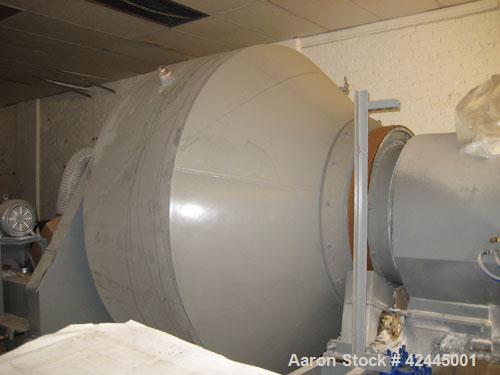 Used Munson Rotary Batch Mixer, Model 90T. 90 Cubic foot capacity, stainless steel construction. Approximate dimensions: 85" overall length x 50" overall width. Approximate 25 hp motor.
