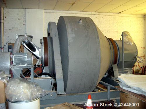 Used Munson Rotary Batch Mixer, Model 90T. 90 Cubic foot capacity, stainless steel construction. Approximate dimensions: 85" overall length x 50" overall width. Approximate 25 hp motor.