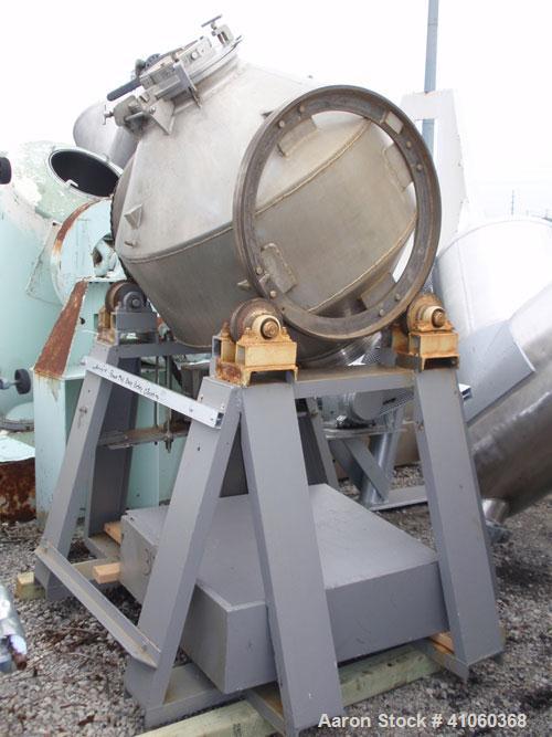 Used Double Cone Blender, 11 Cubic Feet, Stainless Steel. 40" diameter x 14" straight side x 12" cones. 14" top charge with cover, 8" outlet with butterfly valve. Driven by a 1-1/2 hp, 3/60/230/460 v...