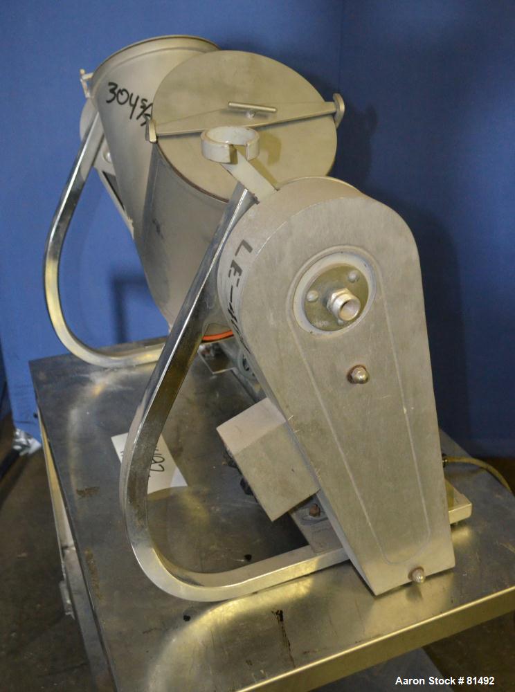Used Patterson-Kelley Twin Shell Liquid-Solids Blender, 0.26 Cubic Feet Capacity (8 Quart), 304 Stainless Steel. (2) 7-1/2" Diameter x 15" deep shells with quick release top covers. Shell driven by a...