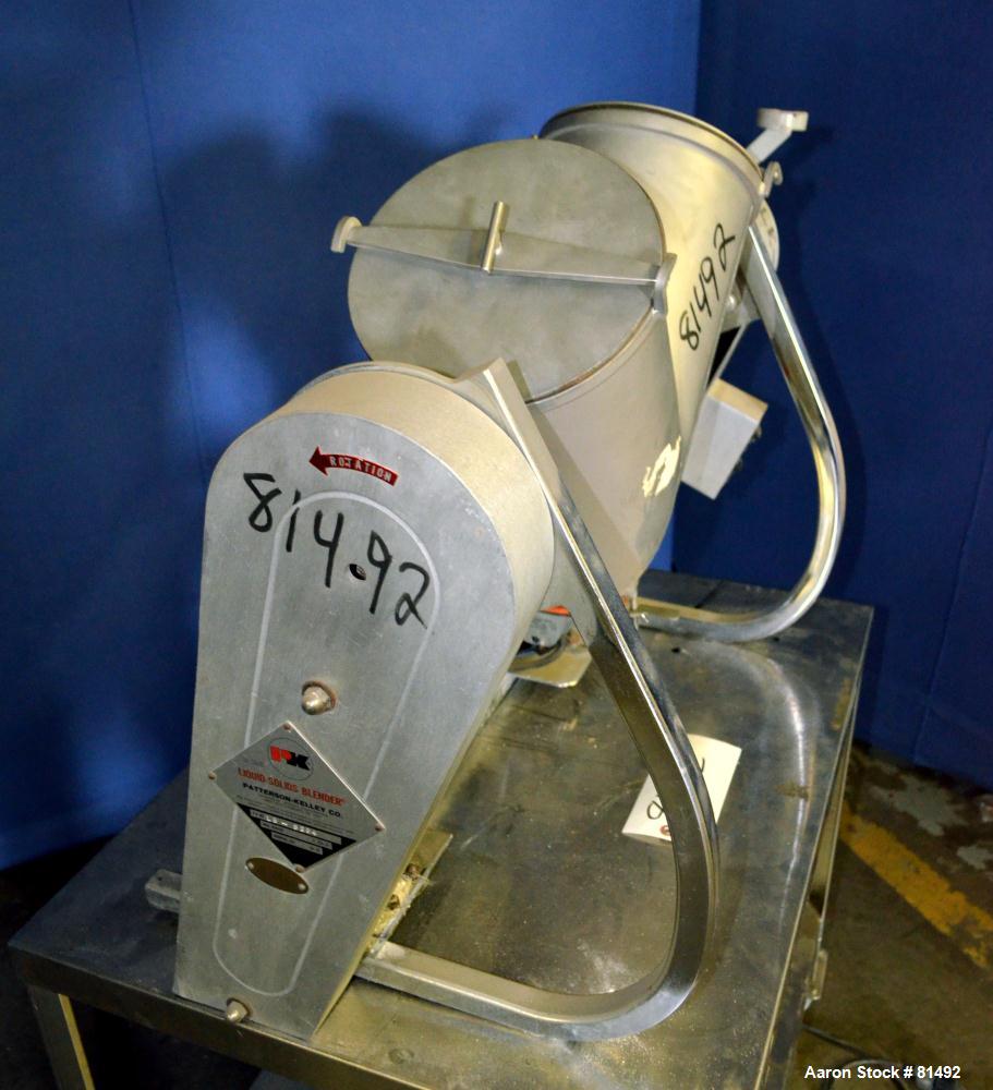 Used Patterson-Kelley Twin Shell Liquid-Solids Blender, 0.26 Cubic Feet Capacity (8 Quart), 304 Stainless Steel. (2) 7-1/2" Diameter x 15" deep shells with quick release top covers. Shell driven by a...