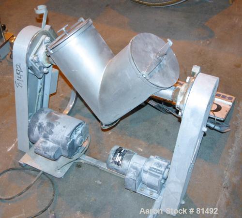 Used Patterson-Kelley Twin Shell Liquid-Solids Blender, 0.26 Cubic Feet Capacity (8 Quart), 304 Stainless Steel. (2) 7-1/2" Diameter x 15" deep shells with quick release top covers. Shell driven by a...