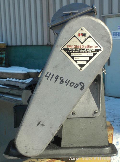 Used Patterson Kelley Twin Shell Dry Blender, 4 Quart Capacity (.16 Cubic Feet), 304 Stainless Steel. (2) 5 1/2" diameter charge ports with quick release covers. Shell 5 1/2" diameter x 9 1/2" deep. ...
