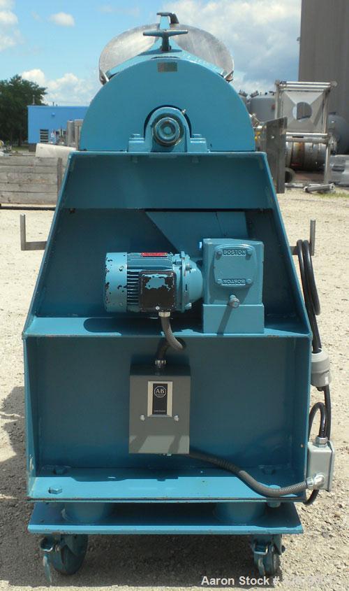 Used Patterson-Kelley Twin Shell Liquid-Solids Blender, 2 cubic feet capacity, 304 stainless steel. 60 Pounds per cubic foot maximum material density. 14’’ Diameter cones. Stainless steel pin intensi...
