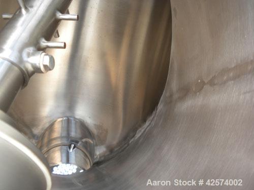 Used Patterson-Kelley Twin Shell Liquid-Solids Blender, 2 cubic feet capacity, 316 stainless steel. 62 Pounds per cubic foot maximum material density. 14’’ Diameter cones. Stainless steel pin intensi...