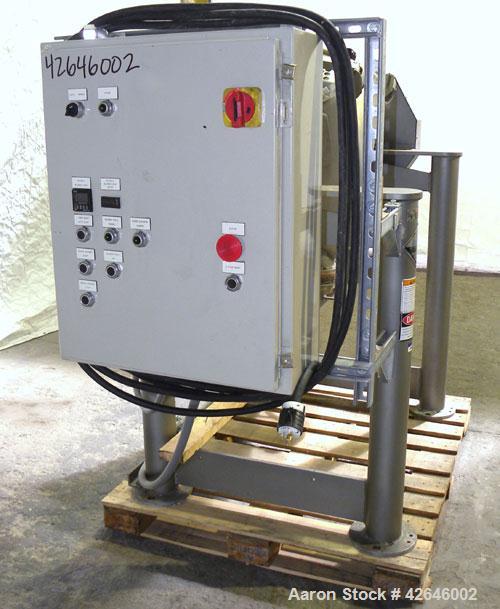 Used Patterson-Kelley Twin Shell Dry Blender, 2 cubic feet capacity, 316 stainless steel. 270 Pounds per cubic foot maximum material density. 14’’ Diameter cones. 316 Stainless steel pin intensifier ...