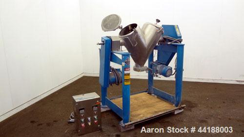 Used Patterson-Kelley Twin Shell Dry Blender, 2 Cubic Feet Capacity, 316 Stainless Steel. 325 Pounds a cubic foot maximum material density. (2) Approximate 13” diameter charge ports with quick releas...