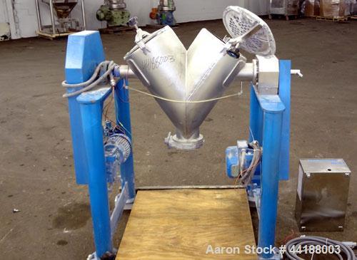 Used Patterson-Kelley Twin Shell Dry Blender, 2 Cubic Feet Capacity, 316 Stainless Steel. 325 Pounds a cubic foot maximum material density. (2) Approximate 13” diameter charge ports with quick releas...