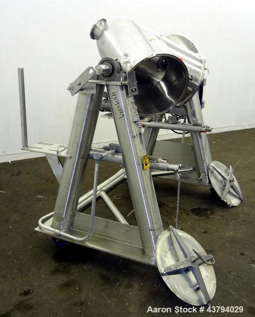 Used Patterson-Kelley Twin Shell Dry Blender, 5 Cubic Feet Capacity, 316 Stainless Steel. 95 Pounds a cubic foot maximum material density. (2) Approximate 19-1/2” diameter charge ports with quick rel...