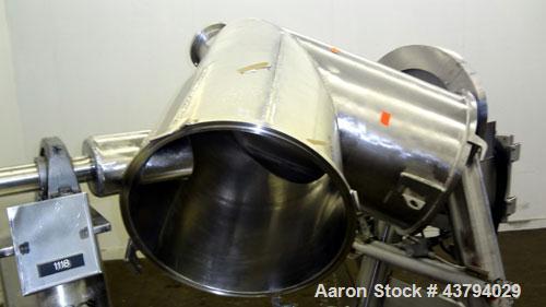 Used Patterson-Kelley Twin Shell Dry Blender, 5 Cubic Feet Capacity, 316 Stainless Steel. 95 Pounds a cubic foot maximum material density. (2) Approximate 19-1/2” diameter charge ports with quick rel...