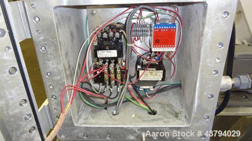Used Patterson-Kelley Twin Shell Dry Blender, 5 Cubic Feet Capacity, 316 Stainless Steel. 95 Pounds a cubic foot maximum material density. (2) Approximate 19-1/2” diameter charge ports with quick rel...