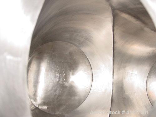 Used Patterson Kelly Twin Shell Cross Flow Blender, 5 cubic feet capacity, 304 stainless steel. Maximum material density 70 pounds per cubic foot. (2) 20" diameter charge ports with quick release cov...