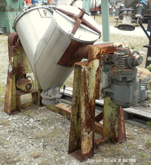 Used Patterson Kelley Twin Shell Dry Blender, 5 Cubic Feet, 304 Stainless Steel. Maximum material density 65 pounds per cubic foot. (2) 18" Diameter openings with quick release covers missing clamps....