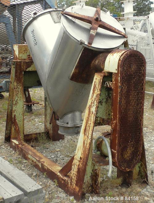 Used Patterson Kelley Twin Shell Dry Blender, 5 Cubic Feet, 304 Stainless Steel. Maximum material density 65 pounds per cubic foot. (2) 18" Diameter openings with quick release covers missing clamps....