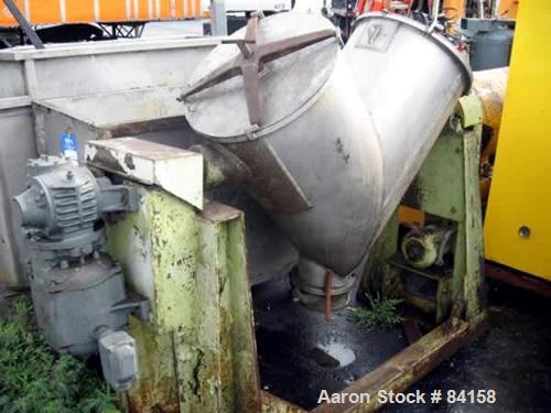Used Patterson Kelley Twin Shell Dry Blender, 5 Cubic Feet, 304 Stainless Steel. Maximum material density 65 pounds per cubic foot. (2) 18" Diameter openings with quick release covers missing clamps....