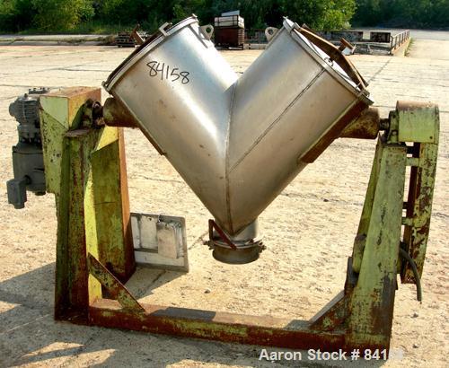 Used Patterson Kelley Twin Shell Dry Blender, 5 Cubic Feet, 304 Stainless Steel. Maximum material density 65 pounds per cubic foot. (2) 18" Diameter openings with quick release covers missing clamps....