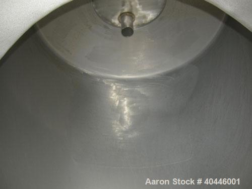 Used Patterson Kelley Twin Shell Dry Blender, 60 Cubic Feet Capacity, 304 Stainless Steel. Maximum material density 50 pounds per cubic foot. 18" diameter charge ports with quick release covers. Shel...