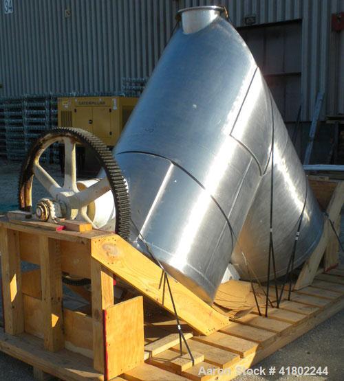 Used Patterson Kelley Twin Shell Dry Blender, 60 Cubic Feet Capacity, 304 Stainless Steel. Maximum material density 50 pounds per cubic foot. 18" diameter charge ports with quick release covers. Shel...