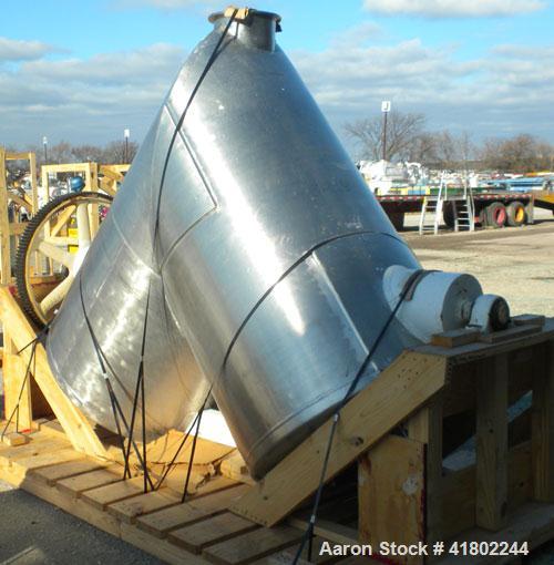 Used Patterson Kelley Twin Shell Dry Blender, 60 Cubic Feet Capacity, 304 Stainless Steel. Maximum material density 50 pounds per cubic foot. 18" diameter charge ports with quick release covers. Shel...