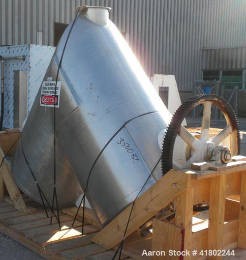 Used Patterson Kelley Twin Shell Dry Blender, 60 Cubic Feet Capacity, 304 Stainless Steel. Maximum material density 50 pounds per cubic foot. 18" diameter charge ports with quick release covers. Shel...