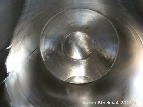 Used Patterson Kelley Twin Shell Dry Blender, 60 Cubic Feet Capacity, 304 Stainless Steel. Maximum material density 50 pounds per cubic foot. 18" diameter charge ports with quick release covers. Shel...