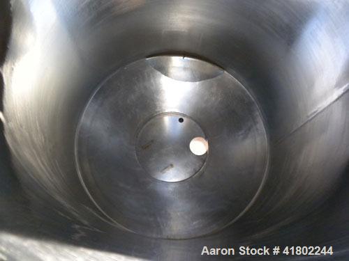 Used Patterson Kelley Twin Shell Dry Blender, 60 Cubic Feet Capacity, 304 Stainless Steel. Maximum material density 50 pounds per cubic foot. 18" diameter charge ports with quick release covers. Shel...