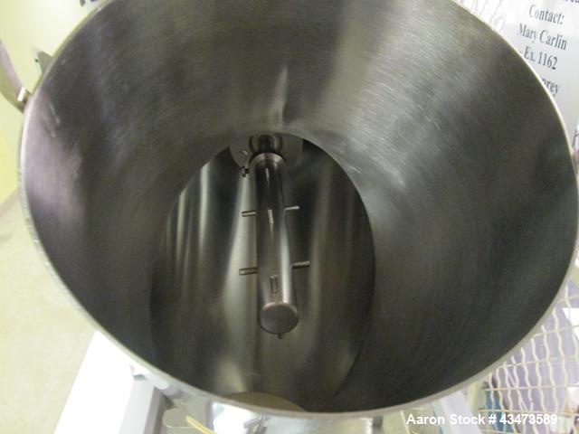 Used Patterson Kelley 16 Quart Blend Master Twin Shell Blender. Has a pin bar.  Bulk density rating 200 lbs/cu ft. Serial# C419381.