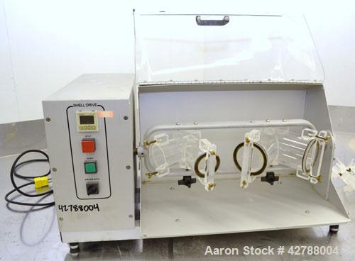 Used Patterson-Kelley Blend Master Lab Blender, Maximum density rating 200 pound a cubic foot. Unit consists of (1) Yoke shell drive system with a 1/3hp, 1/60/115/208-230 volt, 1720 rpm motor, and (7...