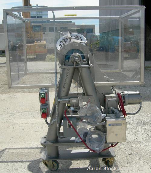 Used Patterson Kelley twin shell dry blender, 2 cubic foot capacity, 316 stainless steel. Max material density 85 pounds per cubic foot. 14" diameter cones with quick release covers. Shell driven by ...